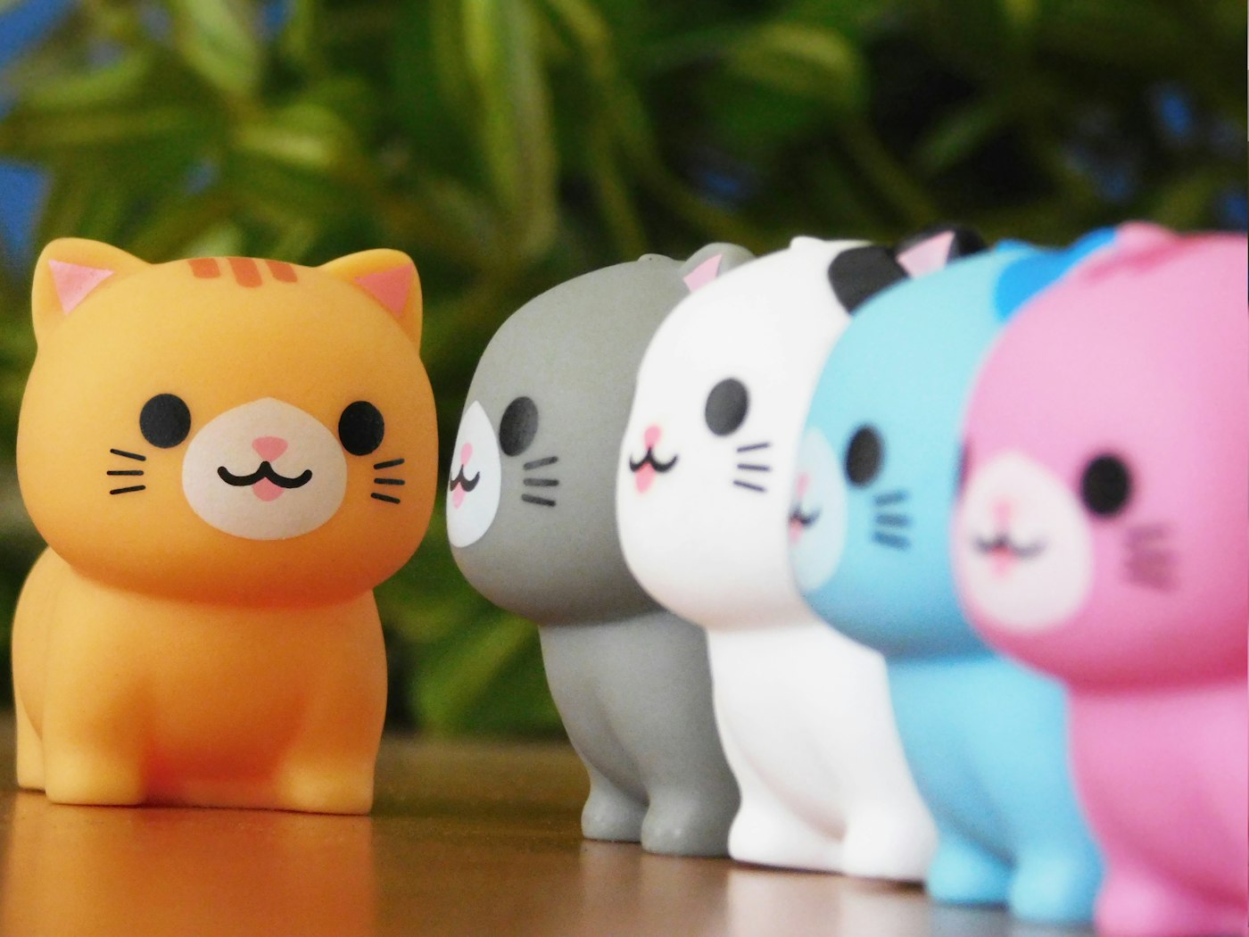 Colorful cute cat toy made of rubber close up view